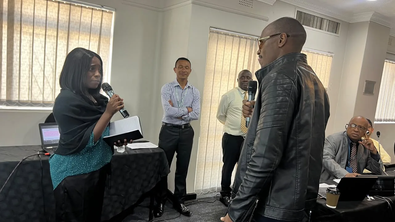Participants engaging in an interactive role-play scenario